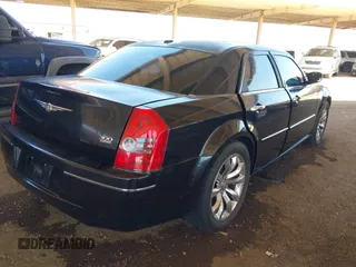 2010 Chrysler 300 Touring with VIN 2C3CA5CV9AH284356, listed as a IAAI auction lot 42124573 with 208,519 mi miles and . Bid and sale history available at DreamBid. Image 4.