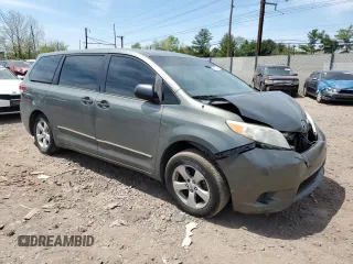 2012 Toyota Sienna z VIN 5TDKA3DCXCS010810, wystawiony jako Copart lot #54872735 z przebiegiem 188 973 mil mil oraz Szkoda całkowita • Salvage title. Historia ofert i sprzedaży dostępna na DreamBid. Obrazek 4.