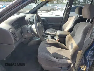 2001 Jeep Grand Cherokee Laredo with VIN 1J4GX48S11C729366, listed as a Copart auction lot 62524565 with 373,749 mi miles and Salvage title. Bid and sale history available at DreamBid. Image 7.