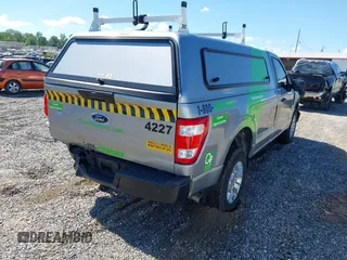2023 Ford F-150 XL with VIN 1FTNF1E5XPKF47161, listed as a IAAI auction lot 42171620 with 14,623 mi miles and . Bid and sale history available at DreamBid. Image 4.
