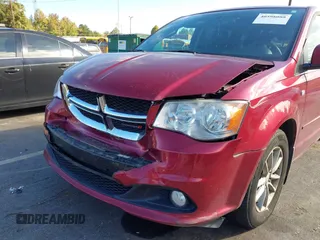 2014 Dodge Grand Caravan SXT with VIN 2C4RDGCG8ER311850, listed as a IAAI auction lot 40598088 with 138,010 mi miles and . Bid and sale history available at DreamBid. Image 6.