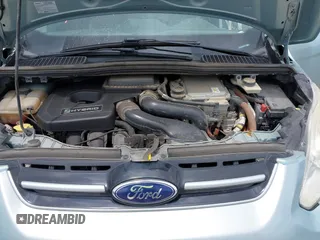 2014 Ford C-Max SE z VIN 1FADP5AU7EL508750, wystawiony jako IAAI lot #42139897 z przebiegiem 117 685 mil mil oraz . Historia ofert i sprzedaży dostępna na DreamBid. Obrazek 10.