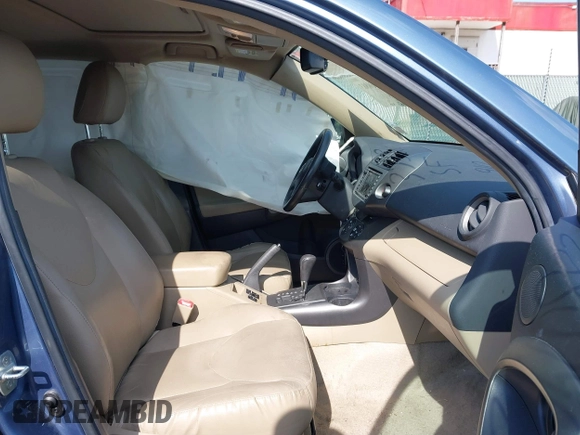 2011 Toyota RAV4 Ltd with VIN 2T3DK4DV6BW054846, listed as a IAAI auction lot 37560883 with 122,983 mi miles. Bid and sale history available at carsss.com. Image 5.