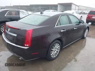 2010 Cadillac CTS Luxury with VIN 1G6DE5EG7A0123935, listed as a IAAI auction lot 41380563 with 182,671 mi miles. Bid and sale history available at carsss.com. Image 4.