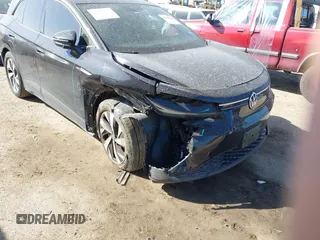 2023 Volkswagen ID.4 Pro with VIN 1V2CMPE82PC008195, listed as a IAAI auction lot 41828830 with 32,336 mi miles and . Bid and sale history available at DreamBid. Image 6.