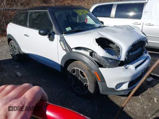2014 MINI Paceman S with VIN WMWSS5C5XEWN66742, listed as a IAAI auction lot 41198686 with 80,559 mi miles and . Bid and sale history available at DreamBid. Image 1.