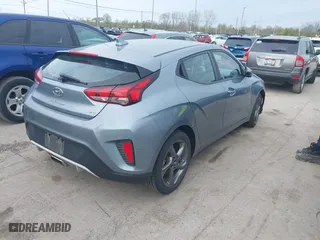 2019 Hyundai Veloster 2.0 with VIN KMHTG6AF0KU017161, listed as a IAAI auction lot 42104203 with 92,420 mi miles. Bid and sale history available at carsss.com. Image 4.