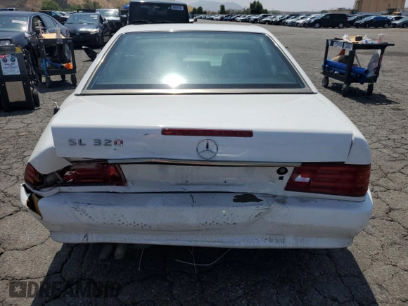 1994 Mercedes-Benz SL with VIN WDBFA63E8RF100874, listed as a Copart auction lot 59604935 with 146,006 mi miles and Salvage title. Bid and sale history available at DreamBid. Image 6.