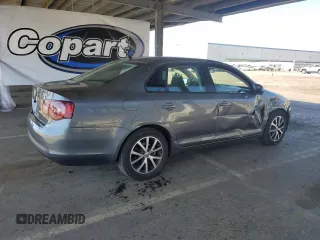 2010 Volkswagen Jetta S with VIN 3VWJZ7AJ9AM052569, listed as a Copart auction lot 59016965 with 166,950 mi miles and Salvage title. Bid and sale history available at DreamBid. Image 3.