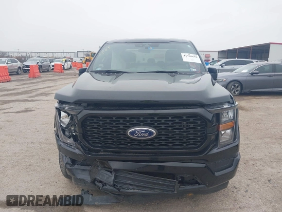 2023 Ford F-150 XL with VIN 1FTEW1C55PKD01184, listed as a IAAI auction lot 41700658 with 18,804 mi miles. Bid and sale history available at carsss.com. Image 12.