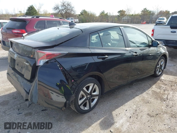 2017 Toyota Prius Two with VIN JTDKARFU5H3045014, listed as a IAAI auction lot 42152419 with 69,760 mi miles and . Bid and sale history available at DreamBid. Image 4.