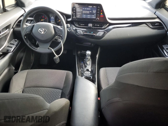 2021 Toyota C-HR LE with VIN JTNKHMBX6M1099910, listed as a Copart auction lot 82800054 with 43,276 mi miles and Salvage Title. Bid and sale history available at DreamBid. Image 8.