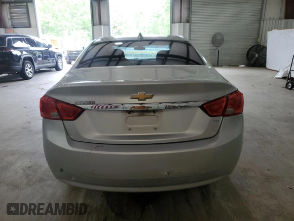 2016 Chevrolet Impala LS with VIN 1G11Z5SA8GU164525, listed as a Copart auction lot 52069595 with 200,385 mi miles and Salvage title. Bid and sale history available at DreamBid. Image 6.