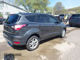 2017 Ford Escape SE with VIN 1FMCU0GD6HUE52948, listed as a IAAI auction lot 41981065 with 63,971 mi miles and . Bid and sale history available at DreamBid. Image 4.