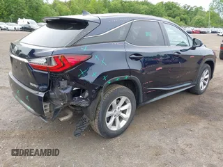 2016 Lexus RX 350 with VIN 2T2BZMCA6GC010568, listed as a IAAI auction lot 42352197 with 72,146 mi miles and . Bid and sale history available at DreamBid. Image 4.