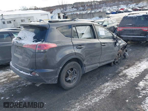 2017 Toyota RAV4 LE with VIN JTMZFREV9HJ119332, listed as a IAAI auction lot 41257790 with 94,992 mi miles and . Bid and sale history available at carsss.com. Image 4.