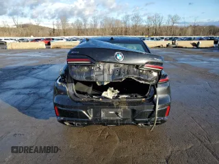 2023 BMW 7 Series 760i xDrive with VIN WBA33EJ0XPCM80117, listed as a Copart auction lot 84407104 with Not provided miles and Salvage title. Bid and sale history available at DreamBid. Image 6.