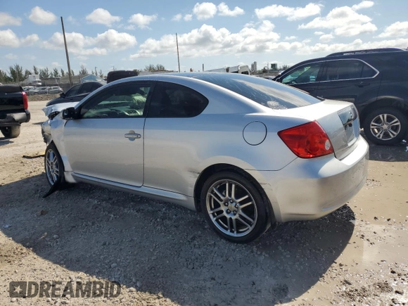2005 Scion tC with VIN JTKDE177650059937, listed as a Copart auction lot 56122335 with 181,256 mi miles and Salvage Title. Bid and sale history available at DreamBid. Image 2.