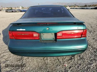 1997 Ford Thunderbird LX with VIN 1FALP62W4VH170423, listed as a Copart auction lot 83379614 with 93,117 mi miles and Salvage Title. Bid and sale history available at DreamBid. Image 6.