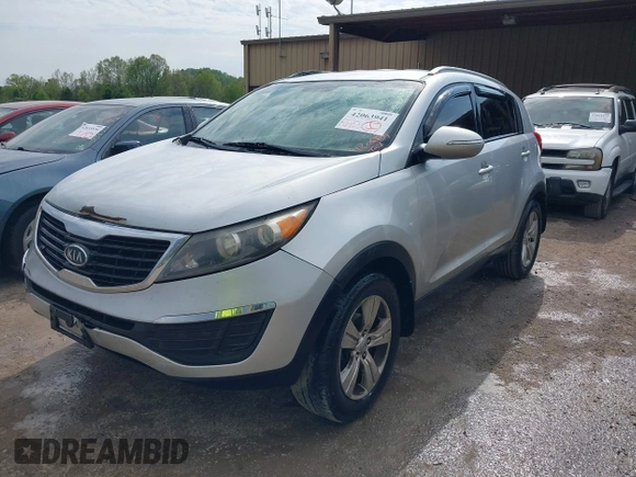 2011 Kia Sportage LX with VIN KNDPB3A23B7053943, listed as a IAAI auction lot 42063941 with 234,364 mi miles and . Bid and sale history available at carsss.com. Image 2.