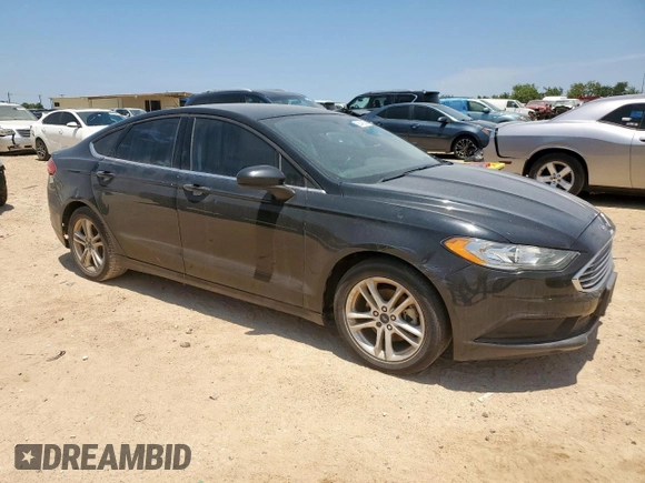 2018 Ford Fusion SE z VIN 3FA6P0HD5JR252718, wystawiony jako Copart lot #60549335 z przebiegiem 120 807 mil mil oraz Czysty tytuł • Clean title. Historia ofert i sprzedaży dostępna na DreamBid. Obrazek 4.