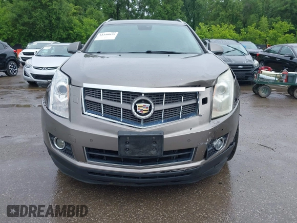 2012 Cadillac SRX Premium Collection z VIN 3GYFNCE3XCS620507, wystawiony jako IAAI lot #42348835 z przebiegiem 184 737 mil mil oraz . Historia ofert i sprzedaży dostępna na DreamBid. Obrazek 6.