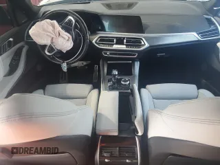 2023 BMW X5 xDrive40i with VIN 5UXCR6C07P9R18608, listed as a Copart auction lot 55911595 with Not provided miles and Salvage title. Bid and sale history available at DreamBid. Image 8.