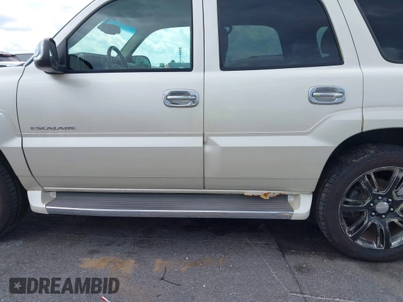 2005 Cadillac Escalade z VIN 1GYEK63N55R123817, wystawiony jako IAAI lot #42263549 z przebiegiem 297 279 mil mil oraz . Historia ofert i sprzedaży dostępna na DreamBid. Obrazek 13.