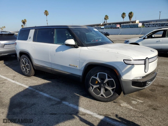 2024 Rivian R1S Adventure with VIN 7PDSGABA6RN043721, listed as a Copart auction lot 64231094 with 0 mi miles and Salvage Title. Bid and sale history available at carsss.com. Image 4.