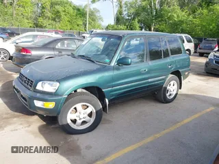 1999 Toyota RAV4 with VIN JT3HP10V3X7150917, listed as a IAAI auction lot 42206224 with 193,687 mi miles and . Bid and sale history available at DreamBid. Image 2.