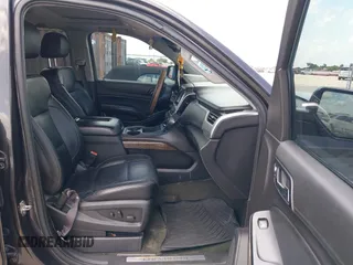 2015 Chevrolet Suburban LT z VIN 1GNSKJKC9FR245097, wystawiony jako IAAI lot #42468168 z przebiegiem 198 454 mil mil oraz . Historia ofert i sprzedaży dostępna na DreamBid. Obrazek 5.