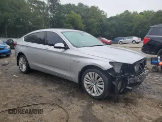 2015 BMW 5 Series 535i Gran Turismo xDrive with VIN WBA5M4C55FD186514, listed as a Copart auction lot 69410704 with 124,398 mi miles and Salvage title. Bid and sale history available at DreamBid. Image 4.