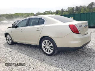 2011 Lincoln MKS EcoBoost with VIN 1LNHL9FT0BG601897, listed as a Copart auction lot 52746045 with 139,924 mi miles and Salvage Title. Bid and sale history available at DreamBid. Image 2.