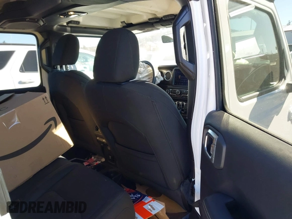 2023 Jeep Gladiator High Altitude with VIN 1C6HJTFG4PL560982, listed as a IAAI auction lot 41236477 with 28,835 mi miles and . Bid and sale history available at DreamBid. Image 8.