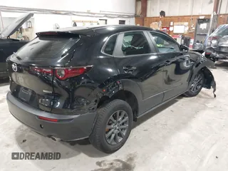 2021 Mazda CX-30 S with VIN 3MVDMBAL0MM226504, listed as a IAAI auction lot 41619102 with 87,998 mi miles and . Bid and sale history available at carsss.com. Image 4.