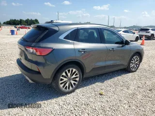 2020 Ford Escape Titanium Hybrid z VIN 1FMCU0DZ1LUC38345, wystawiony jako Copart lot #59628985 z przebiegiem 86 917 mil mil oraz Szkoda całkowita • Salvage title. Historia ofert i sprzedaży dostępna na DreamBid. Obrazek 3.