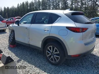 2018 Mazda CX-5 Grand Touring z VIN JM3KFADM7J0318684, wystawiony jako IAAI lot #42226937 z przebiegiem 69 166 mil mil oraz . Historia ofert i sprzedaży dostępna na DreamBid. Obrazek 3.