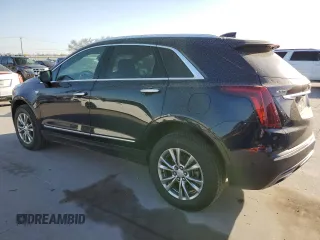 2021 Cadillac XT5 FWD Premium Luxury with VIN 1GYKNCRS5MZ138712, listed as a Copart auction lot 49697945 with 54,893 mi miles and Salvage Title. Bid and sale history available at carsss.com. Image 2.