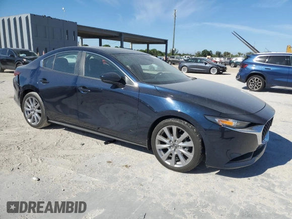 2023 Mazda 3 S Preferred with VIN 3MZBPACMXPM374998, listed as a Copart auction lot 50131565 with 6,303 mi miles and Salvage Title. Bid and sale history available at DreamBid. Image 4.