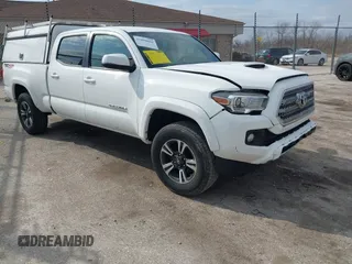 2017 Toyota Tacoma SR5 with VIN 3TMDZ5BN4HM018877, listed as a IAAI auction lot 41898666 with 198,848 mi miles. Bid and sale history available at carsss.com. Image 1.