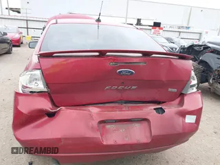 2009 Ford Focus SES with VIN 1FAHP36N59W244231, listed as a IAAI auction lot 41967664 with 141,937 mi miles. Bid and sale history available at carsss.com. Image 6.