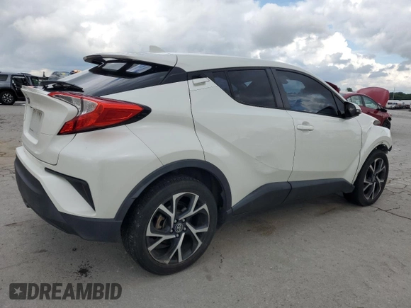 2018 Toyota C-HR XLE с VIN NMTKHMBX6JR016848, выставлен на аукционе Copart как лот 56939615 с пробегом 65 510 миль миль и Списание • Salvage title. История ставок и продаж доступна на DreamBid. Изображение 3.