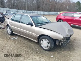 1997 Pontiac Grand Am SE with VIN 1G2NE52T1VC761092, listed as a IAAI auction lot 41547391 with 297,392 mi miles. Bid and sale history available at carsss.com. Image 1.