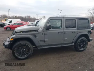 2021 Jeep Wrangler Unlimited Sport S with VIN 1C4HJXDG5MW614688, listed as a IAAI auction lot 41678964 with 89,309 mi miles. Bid and sale history available at carsss.com. Image 20.