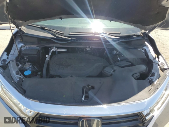 2023 Honda Odyssey Touring with VIN 5FNRL6H86PB043474, listed as a Copart auction lot 61672545 with 39,176 mi miles and Salvage title. Bid and sale history available at DreamBid. Image 11.