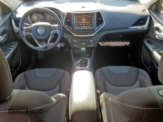 2016 Jeep Cherokee Latitude with VIN 1C4PJLCB8GW125748, listed as a Copart auction lot 60697145 with 118,276 mi miles and Salvage title. Bid and sale history available at DreamBid. Image 8.