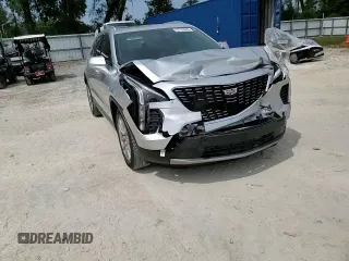 2019 Cadillac XT4 FWD Premium Luxury z VIN 1GYFZCR44KF195554, wystawiony jako Copart lot #55728095 z przebiegiem 35 948 mil mil oraz Nie do naprawy. Historia ofert i sprzedaży dostępna na DreamBid. Obrazek 14.