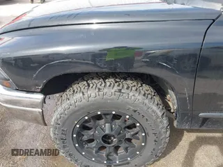 2004 Dodge Dakota SLT with VIN 1D7HL48N04S654059, listed as a IAAI auction lot 41811540 with 165,615 mi miles. Bid and sale history available at carsss.com. Image 6.