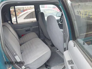 1994 Ford Explorer Eddie Bauer z VIN 1FMDU34X8RUE72074, wystawiony jako IAAI lot #42738965 z przebiegiem 87 431 mil mil oraz . Historia ofert i sprzedaży dostępna na DreamBid. Obrazek 8.
