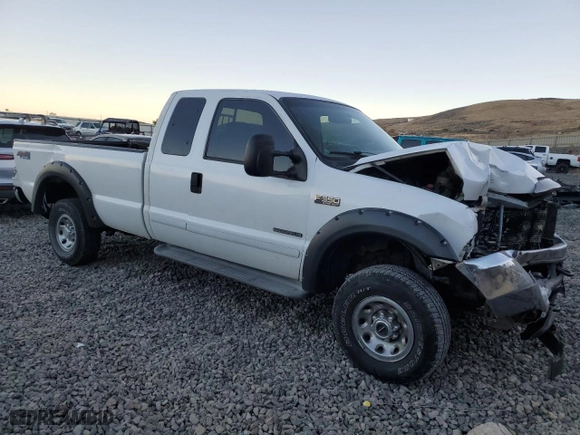 2002 Ford Super Duty F-350 SRW XL with VIN 1FTSX31F42EA60135, listed as a Copart auction lot 80014234 with 250,855 mi miles and Salvage Title. Bid and sale history available at carsss.com. Image 4.
